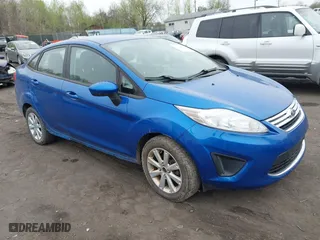 2011 Ford Fiesta SE with VIN 3FADP4BJ0BM227544, listed as a IAAI auction lot 42096464 with 176,044 mi miles. Bid and sale history available at carsss.com. Image 1.