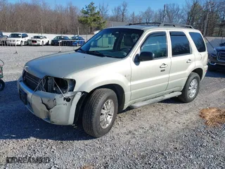 2006 Mercury Mariner Luxury with VIN 4M2CU56156DJ05613, listed as a IAAI auction lot 41305481 with 164,896 mi miles. Bid and sale history available at carsss.com. Image 2.