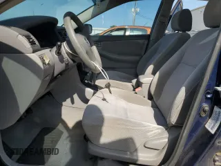2004 Toyota Corolla CE with VIN 1NXBR32E64Z219676, listed as a Copart auction lot 54433135 with 187,495 mi miles and Salvage Title. Bid and sale history available at DreamBid. Image 7.