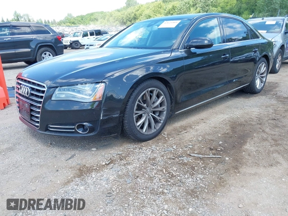 2011 Audi A8 with VIN WAURVAFD6BN005425, listed as a IAAI auction lot 42623409 with 264,365 mi miles and . Bid and sale history available at DreamBid. Image 2.