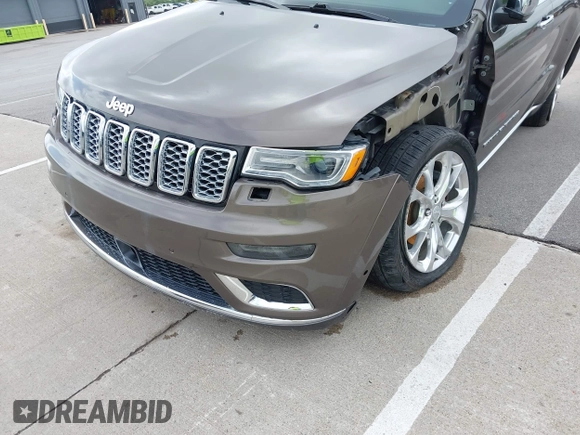 2020 Jeep Grand Cherokee Summit with VIN 1C4RJFJG1LC170714, listed as a IAAI auction lot 42247702 with 78,614 mi miles and . Bid and sale history available at DreamBid. Image 18.