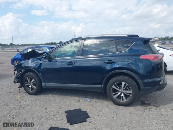 2018 Toyota RAV4 XLE with VIN JTMWFREV8JJ172645, listed as a IAAI auction lot 41734624 with 105,674 mi miles. Bid and sale history available at carsss.com. Image 10.
