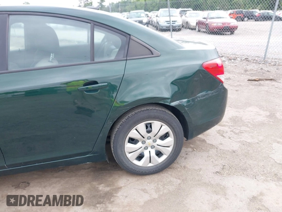 2014 Chevrolet Cruze LS with VIN 1G1PA5SH3E7351133, listed as a IAAI auction lot 42252807 with 122,866 mi miles and . Bid and sale history available at DreamBid. Image 6.