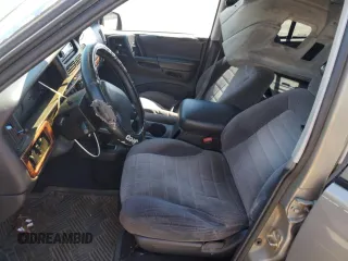 1997 Jeep Grand Cherokee Laredo with VIN 1J4GZ58S7VC505069, listed as a Copart auction lot 63255945 with 127,552 mi miles and Salvage title. Bid and sale history available at DreamBid. Image 7.