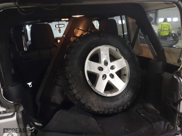 2017 Jeep Wrangler Unlimited Sport with VIN 1C4BJWDG5HL551406, listed as a IAAI auction lot 41618566 with 87,634 mi miles. Bid and sale history available at carsss.com. Image 12.