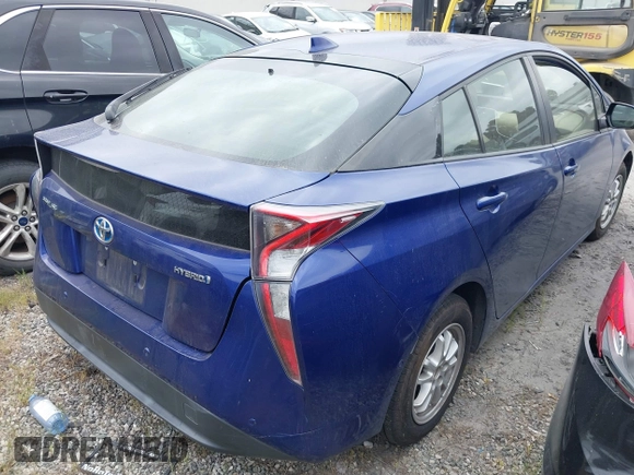 2017 Toyota Prius Two with VIN JTDKBRFU6H3560617, listed as a IAAI auction lot 41935727 with 63,892 mi miles and . Bid and sale history available at carsss.com. Image 4.