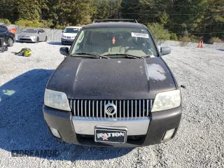 2006 Mercury Mariner Convenience z VIN 4M2YU56Z06KJ00794, wystawiony jako Copart lot #79389584 z przebiegiem 211 103 mil mil oraz Szkoda całkowita • Salvage title. Historia ofert i sprzedaży dostępna na DreamBid. Obrazek 5.