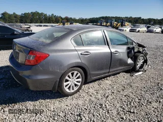2012 Honda Civic EX-L with VIN 19XFB2F94CE048523, listed as a Copart auction lot 77019404 with 210,391 mi miles and Salvage Title. Bid and sale history available at DreamBid. Image 3.