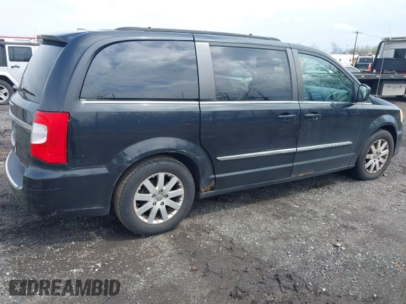 2011 Chrysler Town & Country Touring L with VIN 2A4RR8DG7BR641782, listed as a IAAI auction lot 42042025 with 141,884 mi miles and . Bid and sale history available at DreamBid. Image 4.