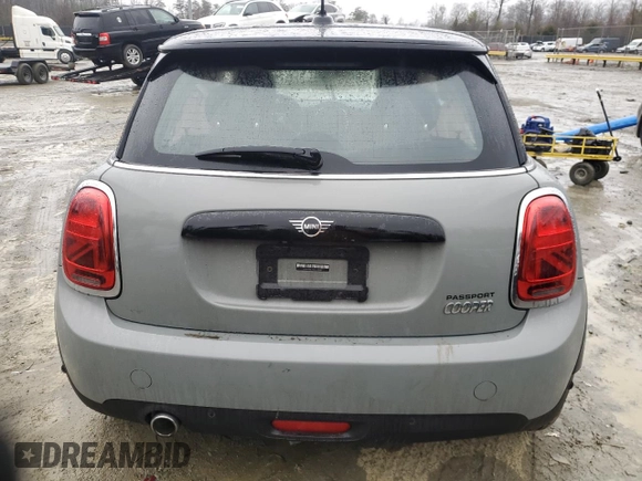 2021 MINI Hardtop Cooper with VIN WMWXR3C04M2N98103, listed as a Copart auction lot 42589255 with 61,317 mi miles and Salvage title. Bid and sale history available at DreamBid. Image 6.