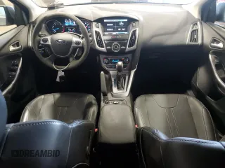 2014 Ford Focus Titanium z VIN 1FADP3N27EL462950, wystawiony jako Copart lot #65207155 z przebiegiem 34 058 mil mil oraz Szkoda całkowita • Salvage title. Historia ofert i sprzedaży dostępna na DreamBid. Obrazek 8.