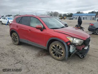 2016 Mazda CX-5 Grand Touring with VIN JM3KE2DY9G0678060, listed as a Copart auction lot 44690415 with 167,043 mi miles and Salvage Title. Bid and sale history available at carsss.com. Image 4.