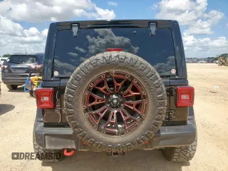 2020 Jeep Wrangler Unlimited Rubicon with VIN 1C4HJXFG5LW107933, listed as a Copart auction lot 62012515 with 60,115 mi miles and Salvage title. Bid and sale history available at DreamBid. Image 6.