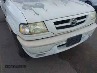 2002 Mazda B-Series Truck DS z VIN 4F4YR16U32TM12981, wystawiony jako IAAI lot #42421997 z przebiegiem 130 610 mil mil oraz . Historia ofert i sprzedaży dostępna na DreamBid. Obrazek 6.