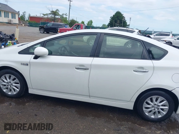 2014 Toyota Prius with VIN JTDKN3DP6E3055058, listed as a IAAI auction lot 42233555 with 133,718 mi miles and . Bid and sale history available at DreamBid. Image 14.