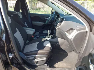 2014 Jeep Cherokee Sport with VIN 1C4PJLAB4EW110051, listed as a IAAI auction lot 41961698 with 153,570 mi miles and . Bid and sale history available at DreamBid. Image 5.
