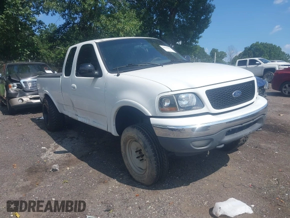 2001 Ford F-150 XL with VIN 1FTRX18L71NB11026, listed as a IAAI auction lot 42590063 with 218,156 mi miles and . Bid and sale history available at DreamBid. Image 1.