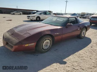 1986 Chevrolet Corvette with VIN 1G1YY0789G5118657, listed as a Copart auction lot 77743794 with 97,673 mi miles and Salvage Title. Bid and sale history available at carsss.com. Image 1.