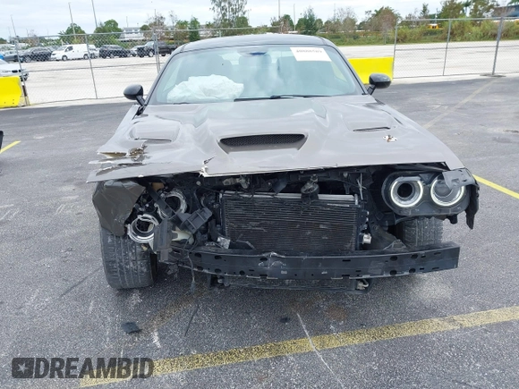2016 Dodge Challenger R/T Scat Pack z VIN 2C3CDZFJ2GH254938, wystawiony jako IAAI lot #40888589 z przebiegiem 114 582 mil mil oraz . Historia ofert i sprzedaży dostępna na DreamBid. Obrazek 6.