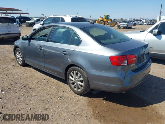 2014 Volkswagen Jetta SE z VIN 3VWD17AJXEM417724, wystawiony jako IAAI lot #42481164 z przebiegiem 98 613 mil mil oraz . Historia ofert i sprzedaży dostępna na DreamBid. Obrazek 3.
