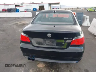 2007 BMW 5 Series 530i with VIN WBANE73527CM57227, listed as a IAAI auction lot 41724097 with 181,689 mi miles. Bid and sale history available at carsss.com. Image 6.