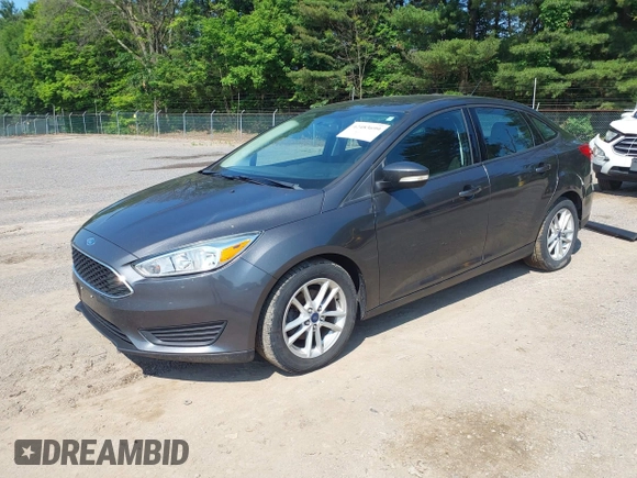 2015 Ford Focus SE with VIN 1FADP3F25FL300945, listed as a IAAI auction lot 42483699 with 76,992 mi miles and . Bid and sale history available at DreamBid. Image 2.