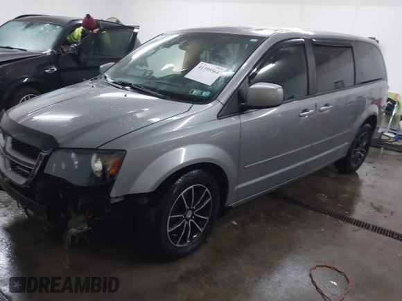 2015 Dodge Grand Caravan SE with VIN 2C4RDGBG9FR703691, listed as a IAAI auction lot 41395564 with 170,735 mi miles and . Bid and sale history available at DreamBid. Image 21.