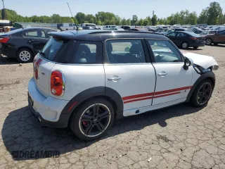2015 MINI Countryman John Cooper Works with VIN WMWXD1C58FWS34860, listed as a Copart auction lot 55384065 with 48,709 mi miles and Salvage Title. Bid and sale history available at DreamBid. Image 3.