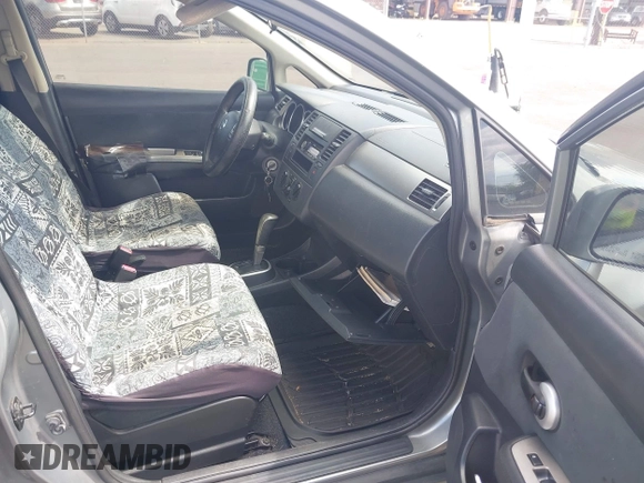 2011 Nissan Versa S with VIN 3N1BC1CP0BL487983, listed as a IAAI auction lot 42476035 with 123,117 mi miles and . Bid and sale history available at DreamBid. Image 5.