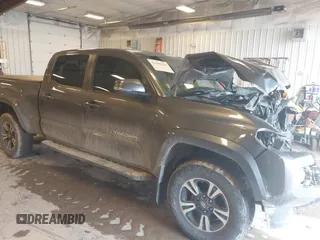 2016 Toyota Tacoma SR5 with VIN 5TFDZ5BN8GX012377, listed as a IAAI auction lot 41688620 with 138,531 mi miles. Bid and sale history available at carsss.com. Image 1.