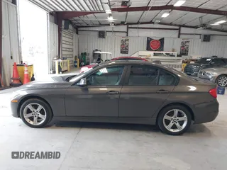 2015 BMW 3 Series 328i with VIN WBA3A5C57FF609734, listed as a IAAI auction lot 41392336 with 121,378 mi miles. Bid and sale history available at carsss.com. Image 14.