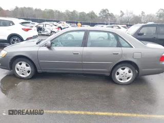 2003 Toyota Avalon XL with VIN 4T1BF28B93U337672, listed as a IAAI auction lot 41626441 with 240,787 mi miles and . Bid and sale history available at carsss.com. Image 14.