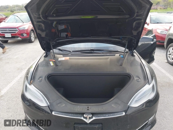 2017 Tesla Model S 100D with VIN 5YJSA1E28HF188981, listed as a IAAI auction lot 42010115 with 76,327 mi miles and . Bid and sale history available at DreamBid. Image 10.
