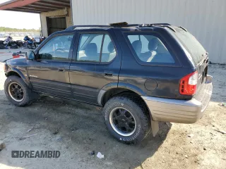 2000 Isuzu Rodeo S with VIN 4S2CK58W7Y4309261, listed as a Copart auction lot 54000775 with 187,949 mi miles and Salvage title. Bid and sale history available at DreamBid. Image 2.
