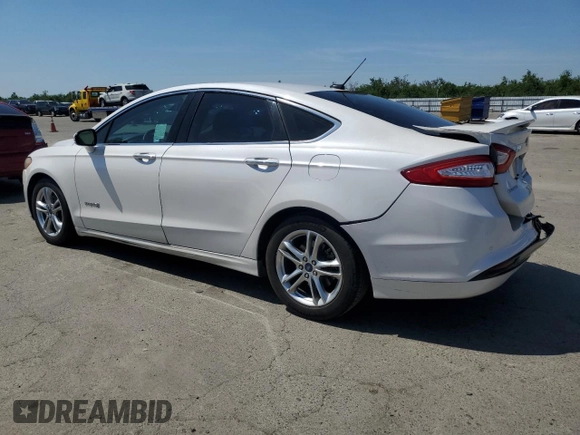 2016 Ford Fusion Titanium Hybrid with VIN 3FA6P0RU9GR145680, listed as a Copart auction lot 52532925 with 238,019 mi miles and Salvage title. Bid and sale history available at DreamBid. Image 2.