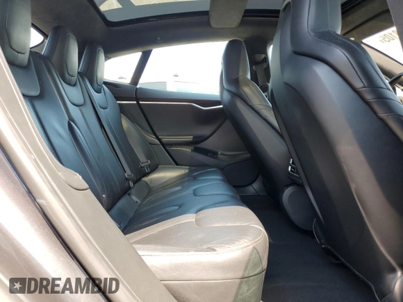 2016 Tesla Model S 90D z VIN 5YJSA1E22GF136325, wystawiony jako Copart lot #65238105 z przebiegiem 182 196 mil mil oraz Szkoda całkowita • Salvage title. Historia ofert i sprzedaży dostępna na DreamBid. Obrazek 10.
