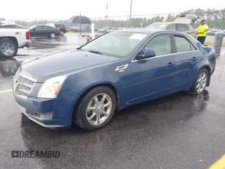 2009 Cadillac CTS AWD w/1SB with VIN 1G6DT57V190120218, listed as a IAAI auction lot 42105030 with 214,031 mi miles. Bid and sale history available at carsss.com. Image 2.
