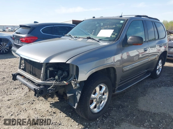 2005 GMC Envoy SLE with VIN 1GKDS13S452306939, listed as a IAAI auction lot 41931667 with 236,955 mi miles and . Bid and sale history available at DreamBid. Image 18.