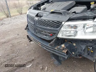 2013 Dodge Journey SXT with VIN 3C4PDDBGXDT519196, listed as a IAAI auction lot 41885545 with 185,180 mi miles and . Bid and sale history available at DreamBid. Image 16.