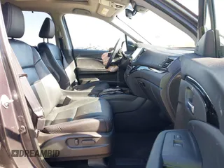 2021 Honda Pilot Touring 8-Passenger with VIN 5FNYF6H97MB034399, listed as a IAAI auction lot 42303419 with 50,034 mi miles and . Bid and sale history available at DreamBid. Image 5.