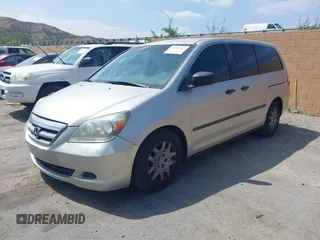 2006 Honda Odyssey LX with VIN 5FNRL38216B123807, listed as a IAAI auction lot 42093313 with 182,783 mi miles. Bid and sale history available at carsss.com. Image 2.