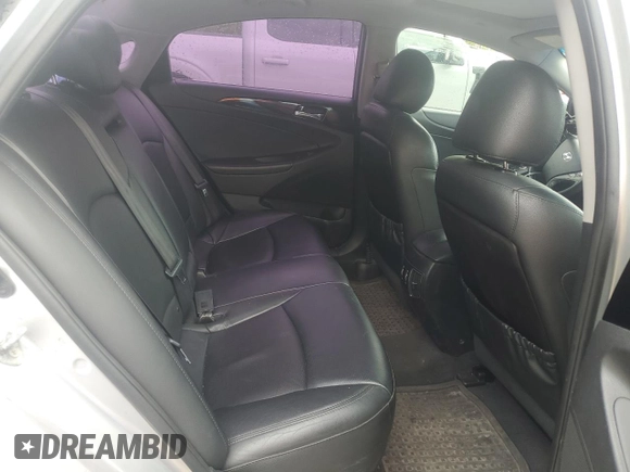 2012 Hyundai Sonata SE z VIN 5NPEC4AC3CH489045, wystawiony jako Copart lot #57980785 z przebiegiem 241 729 mil mil oraz Czysty tytuł • Clean title. Historia ofert i sprzedaży dostępna na DreamBid. Obrazek 10.