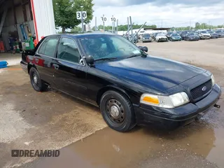 2005 Ford Police Interceptor z VIN 2FAHP71WX5X154384, wystawiony jako IAAI lot #40735796 z przebiegiem 84 143 mil mil oraz . Historia ofert i sprzedaży dostępna na DreamBid. Obrazek 1.