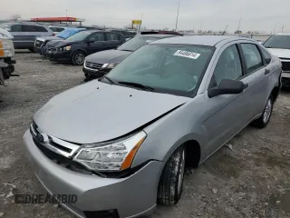 2009 Ford Focus SE with VIN 1FAHP35N89W133867, listed as a Copart auction lot 84486614 with 52,005 mi miles and Salvage Title. Bid and sale history available at carsss.com. Image 1.