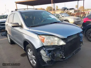 2008 Honda CR-V EX with VIN 3CZRE38568G706370, listed as a IAAI auction lot 41031674 with 124,494 mi miles. Bid and sale history available at carsss.com. Image 1.
