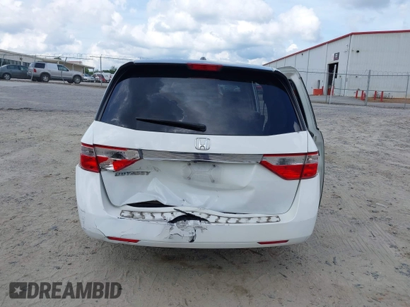 2011 Honda Odyssey EX-L with VIN 5FNRL5H67BB011070, listed as a IAAI auction lot 42491685 with 200,671 mi miles and . Bid and sale history available at DreamBid. Image 6.