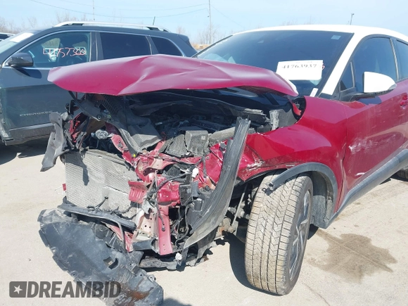 2018 Toyota C-HR XLE with VIN NMTKHMBX2JR012246, listed as a IAAI auction lot 41735772 with 124,467 mi miles. Bid and sale history available at carsss.com. Image 6.