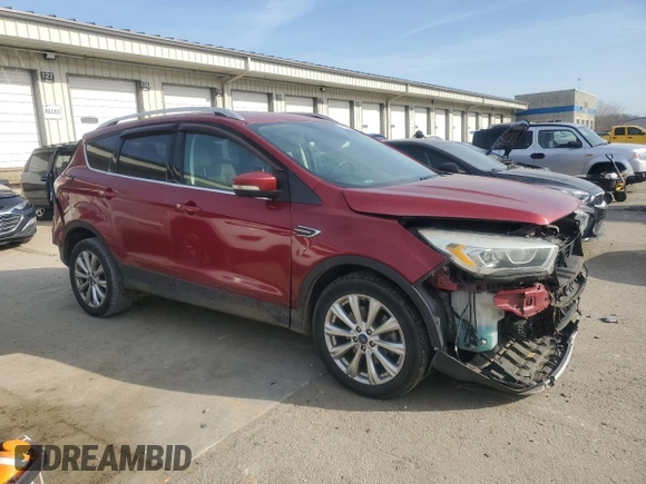 2017 Ford Escape Titanium with VIN 1FMCU0J99HUA37823, listed as a Copart auction lot 48224185 with 133,633 mi miles and Salvage Title. Bid and sale history available at DreamBid. Image 4.