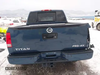 2015 Nissan Titan SV z VIN 1N6AA0ECXFN507260, wystawiony jako IAAI lot #41203612 z przebiegiem 103 000 mil mil oraz . Historia ofert i sprzedaży dostępna na DreamBid. Obrazek 16.