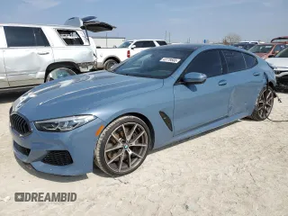 2022 BMW 8 Series M850i with VIN WBAGV8C06NCH98097, listed as a Copart auction lot 43779565 with 18,740 mi miles and Salvage Title. Bid and sale history available at carsss.com. Image 1.